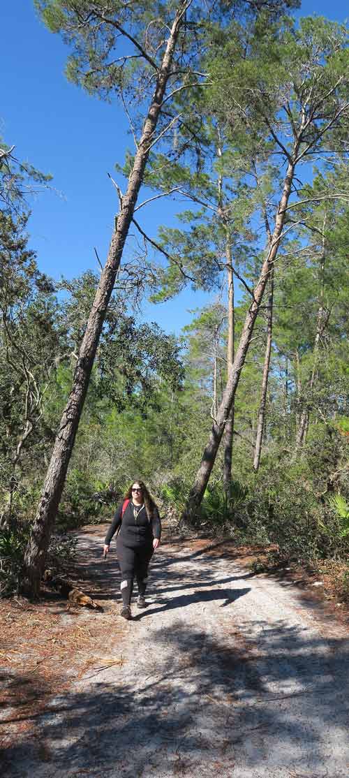 Katie-Bernier-of-OGT-hiking-in-the-Lake-Lizzie-Conservation-Area-by-Doug-Alderson