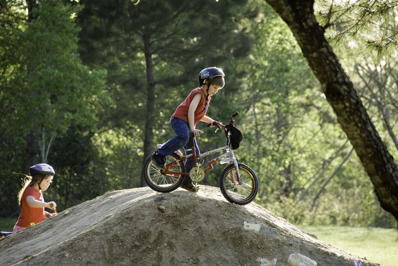 children-on-bikes-on-Santos-by-John-Moran