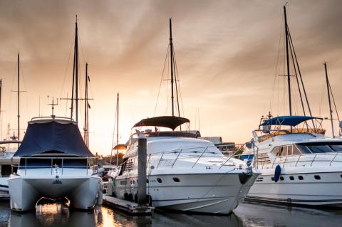 Yacht and boats at the marina in the evening